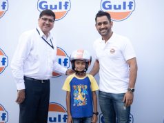 MS Dhoni giving helmets for Guardian on Road campaign