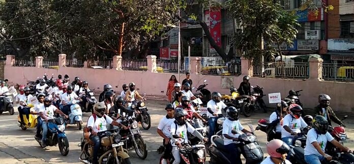 Bikers on their way to NIMHANS