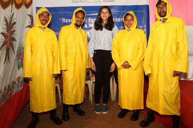 Teen leader Sanjana with rag pickers in india