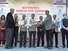 Kiran Ganapathy, Head of Plantations – Operations & Samir Palsule, Head - Business Excellence, Tata Coffee Limited receiving the FICCI award