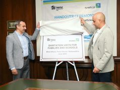 Mohammed S. Al-Herbish, President of Aramco India unveils the plaque to handover the sanitation project