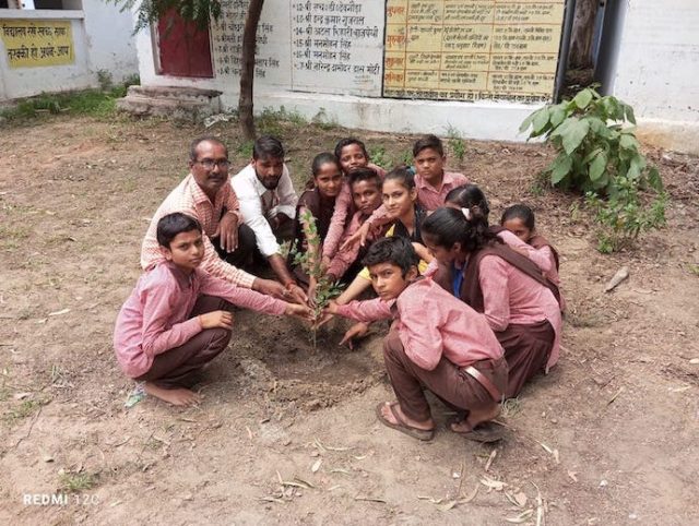 Children of Team Balika Initiative planting saplings at a school in Uttar Pradesh
