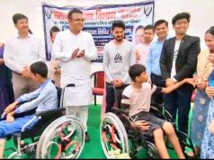 Shri Raaj Kumar Anand, Cabinet Minister for Social Welfare, Labour, Employmen_ Mitesh Rasal, Founder Rut3, Shubham Sutar, Co-Founder & CTO Rut3 at the General Disability Camp, New Delhi handing over wheelchair