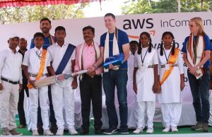 Students receiving gifts from AWS InCommunities