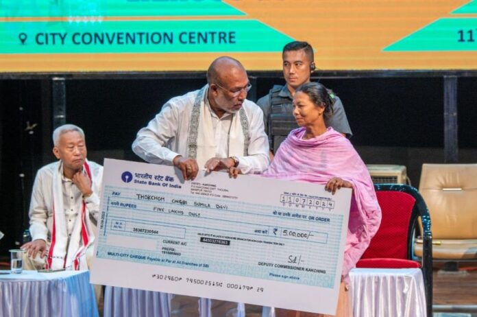 Manipur Chief Minister distributes Rs 300 cr to 4 lakh people under Govt schemes