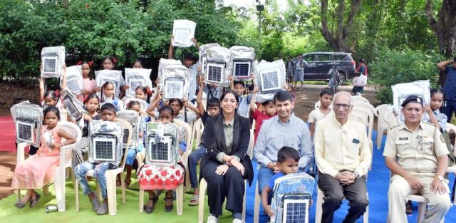 Abhinandan Lodha Yashvi Lodha and students with their Solar Bags along with Forest Authorities Cap