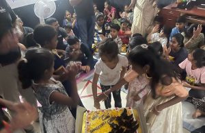 Children at Makkala Jagriti cutting the cake