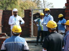 Mr. Ritesh Kamble, Deputy Manager- Technical Engineering, Habitat for Humanity India, leads a safety briefing at the Build site, ensuring all participants are prepared for the Volunteer Build.