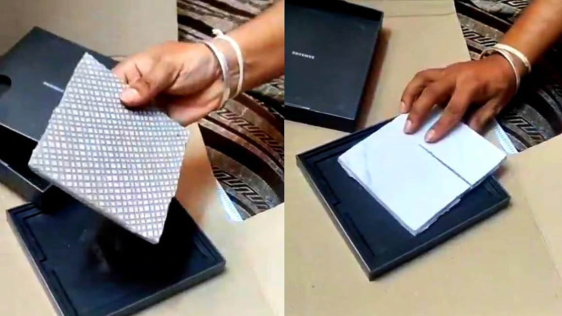 AmazonScam Tile In Samsung Smartphone Box Delivered By Amazon AmazonScam Tile In Samsung Smartphone Box Delivered By Amazon